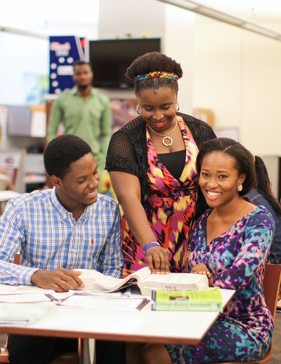 EducationUSA Adviser Helping Student